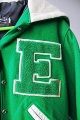 Women's vintage 1989 Nelson's Jacket, Portland, Oregon label bright green wool varsity letterman jacket with white trim. Has snap buttons, patches, pockets, and a hood. Shop more vintage outerwear and sportswear at Live Forever Vintage.