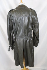 Men's or women's vintage 1970's Made in Argentina label knee length dark grey colored leather trench coat with double lapel and button closure.