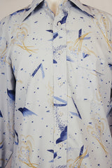 Men's vintage 1980's Landmark label long sleeve button up shirt in light baby blue with all over abstract prints.