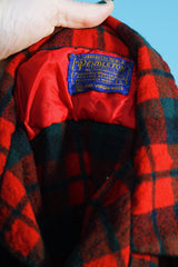 Men's or women's vintage 1960's Pendleton label long sleeve button up plaid shirt in wool material. Red and green colors.