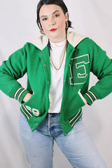 Women's vintage 1989 Nelson's Jacket, Portland, Oregon label bright green wool varsity letterman jacket with white trim. Has snap buttons, patches, pockets, and a hood. Shop more vintage outerwear and sportswear at Live Forever Vintage.