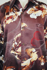Men's vintage 1980's Tori Richard Honolulu, Made in USA label brown polyester button up shirt with all over floral print.