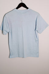 Men's or women's vintage 1970's Hef-T, Tee Jays, Made in USA label baby blue tee with Jim Conway show bright blue graphic on the front in cotton and polyester material.