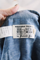 Women's vintage 1970's Western Trends by Panhandle Slim, Made in USA label long sleeve chambray denim top with black and white embroidery.