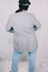 Men's or women's vintage 1970's Designed by Oleg Cassini label long sleeve light grey colored blazer with button closure and front pockets.