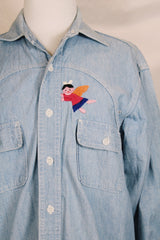 Men's or women's vintage 1970's Lepe, Puerto Vallarta, Mexico label long sleeve light blue denim wash chambray button up shirt with colored embroidery in the front and back.