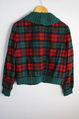 Women's vintage 1960's Pendleton label long sleeve plaid print wool cropped lightweight jacket in red and green colors. Fully lined, buttons up the front, and two front pockets.