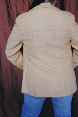 Women's or men's vintage 1970's Styled by Scully in Los Angeles long sleeve long length tan camel colored leather jacket with leather buttons up the front.