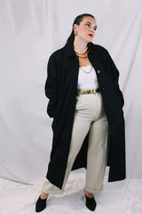 Women's vintage 1990's Nordstrom - Point of View label long sleeve long length black trench coat in a wool material. Fully lined, side pockets, back slit, and shoulder pads.