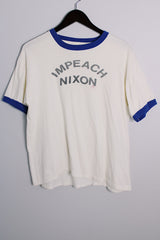 Men's or women's vintage 1970's Quality Sportswear Products, Made in USA label white ringer tee with blue trim and black graphic on the front.