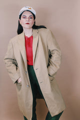 Men's or women's vintage 1960's Cashmere Deluxe Exclusively For Baskin label size large long sleeve long length tan camel colored cashmere coat with button closure.