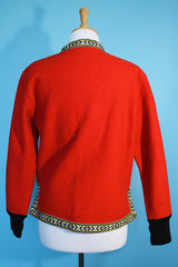 Women's vintage 1960's Product of Norway, Manufactured by Petersen & Dekke label Norwegian style pullover sweater in red wool with decorative trim and metal clasp closures