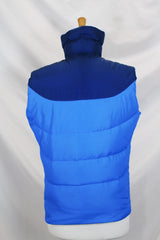 Women's vintage 1980's Tempco, Down Insulated, By Tempco Quilters Seattle, Made in USA label sleeveless navy and blue nylon puffy vest with popper buttons.
