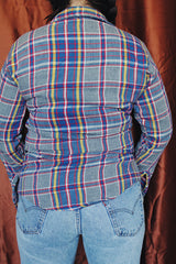 Men's or women's vintage 1970's Big Mac label long sleeve plaid button up flannel shirt in blue, grey, red, and yellow with white buttons.