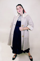 Women's vintage 1960's Mademoiselle Vogues, Fashions in Good Taste 3/4 arm length knee length coat in a wool cream color and cream fur trim on neckline and cuffs.