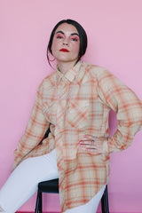 Men's or women's vintage 1970's long sleeve plaid print Western style shirt with pearl white snapper buttons and silver hardware. Light green, coral, yellow, and gold metallic colors.