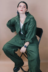 Men's vintage 1980's Men's Coveralls Type 1 label size XL long sleeve army green one piece jumpsuit with button closure and pockets in cotton material.