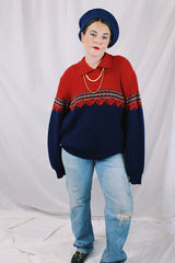 Men's or women's vintage 1970's Kingsport label long sleeve pullover sweater in burnt orange and navy. Built on matching collar. Soft acrylic material.
