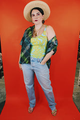 Women's vintage 1960's Jantzen, Made in USA label sleeveless one piece swimsuit in a green and blue print.