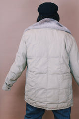 Women's or men's vintage 1980's Tempco Down Insulated, By Tempo Quilters, Seattle, Made in the USA label size large tan colored zip up puffer jacket with grey faux fur trim collar.