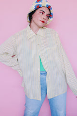 Women's or men's vintage 1960's Hickok label long sleeve light lime green button up pajama shirt with vertical stripes and one left chest pocket.