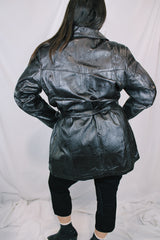 Women's vintage 1980's Leather King label long sleeve dark chocolate brown long length leather coat with button front closure and matching tie belt.