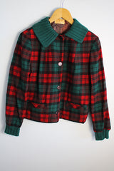 Women's vintage 1960's Pendleton label long sleeve plaid print wool cropped lightweight jacket in red and green colors. Fully lined, buttons up the front, and two front pockets.