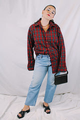 Men's or women's vintage 1980's Pendleton label long sleeve button up shirt in an all over red plaid print. Lightweight wool material, tortoise buttons.