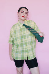 Men's or women's vintage 1960's Cortland short sleeve button up collared shirt with two chest pockets in a green and yellow plaid print.