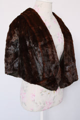 Women's vintage 1960's brown colored genuine fur stole lightweight jacket. Fully lined with an open front.