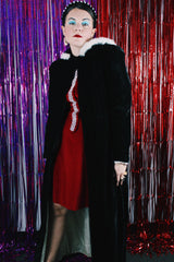 Women's vintage 1950's Consumer's Protection Label, BDW, Manufactured Under Fair Labor Standard label long sleeve long length black velvet hooded duster jacket.