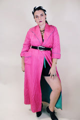 Women's vintage 1950's Lyn Delle label long sleeve long length bright pink quilted robe jacket with teal colored trim.