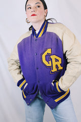 Women's or men's vintage 1960's Shields, Sporting Goods Inc., Vancouver, Washington label long sleeve wool and leather varsity letterman jacket in purple, cream, and yellow colors.