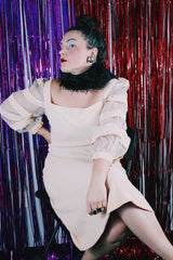 Women's vintage 1980's Made in USA label long sleeve mini length light tan colored dress.