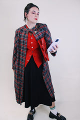 Women's vintage 1960's long label long length plaid tartan print jacket in black and red with gold buttons. Fully lined and has side pockets.