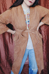 Women's vintage 1970's Joseph Magnin label long length long sleeve camel brown tan colored suede open front jacket.