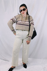 Women's or men's vintage 1980's Norsewear, Made in New Zealand label long sleeve pullover sweater in a tan brown color with abstract print across chest.