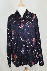 Men's vintage 1970's Maxi & Me California label long sleeve black slinky polyester material button up shirt with all over multi colored paint splatter print.
