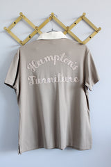 Women's vintage 1970's King Louie Creation, Made in USA label short sleeve polyester material polo top in light beige with cream and orange trim.