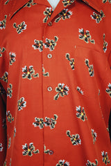 Men's or women's vintage 1970's Design Collection, Bonds label long sleeve lightweight polyester material burnt orange colored button up shirt with all over abstract floral print.