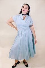 Women's vintage 1960's Toni Todd Original label short sleeve midi length light blue sheer a line dress.