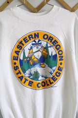 Women's or men's vintage 1980's Buffalo, Made in USA label long sleeve white crew neck pullover sweater in a polyester cotton blend material.