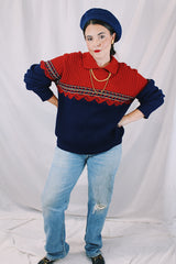 Men's or women's vintage 1970's Kingsport label long sleeve pullover sweater in burnt orange and navy. Built on matching collar. Soft acrylic material.