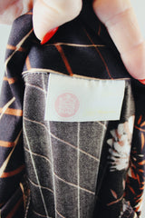 Men's or women's vintage 1970's Kings Road label long sleeve chocolate brown colored button up shirt with all over floral print in a slinky polyester material.