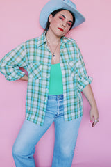 Men's or women's vintage 1970's JCPenney label long sleeve button up shirt in a white, green, and blue plaid print. Clear buttons, two chest pockets.