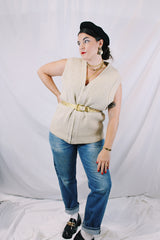 Men's or women's vintage 1970's Norsewear, Made in New Zealand label sleeveless zip up wool material vest in an oatmeal cream color. Ribbed texture all over.