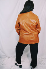 Men's or women's vintage 1970's Grodins label long sleeve tan light brown buttery leather jacket with button closure. Western style.