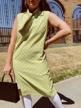 sleeveless mid length shift dress with tie neck grey with yellow floral print vintage 1960's