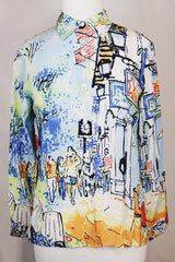 Women's vintage 1980's Michael Leu label long sleeve button up blouse with small collar, white buttons, and all over novelty print in a silk material.