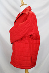 Men's or women's vintage 1980's Minnesota Woolen, Amalgamated Workers of America label long sleeve red nylon quilted lightweight puffy jacket with popper buttons.